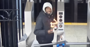 Terrifying Attack: NYC Subway Passenger Targeted with Flaming Liquid Assault!
