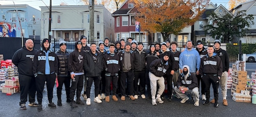 College of Staten Island baseball team helps the Atlas Foundation hand out turkeys for Thanksgiving